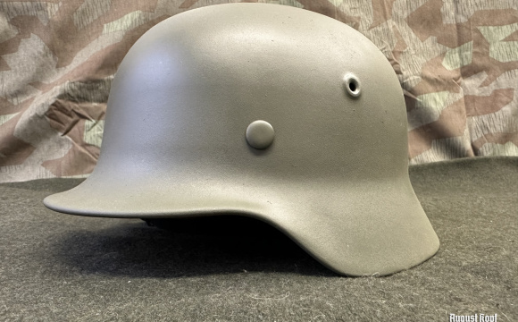 Original German M40 WW2 battle helmet ET66 serial 491, restored for reenactment use.