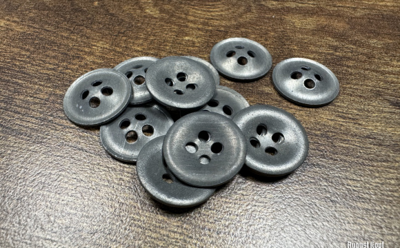 Genuine old production lot of zinc army buttons.