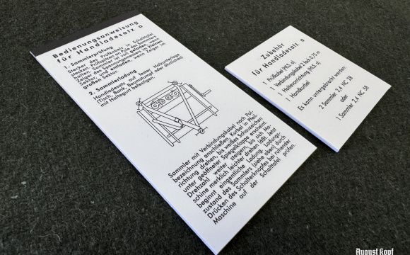 Pair of instructional sheets printed on 1,5mm thick paper desks.