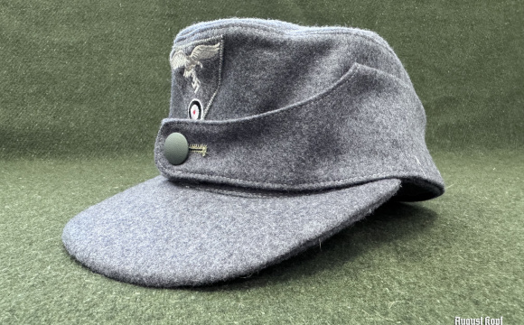 The German M43 field cap was introduced in 1943 as a practical and versatile piece of headgear for Wehrmacht troops.