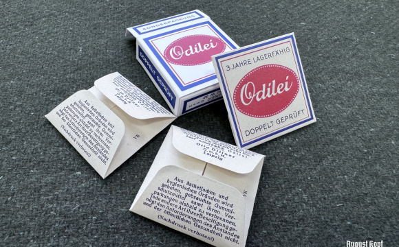 Replica condom box inspired by German designs from the Second World War period.