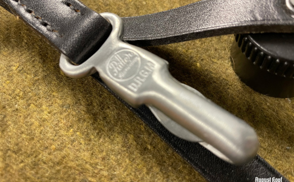 Premium field bottle strap with lid