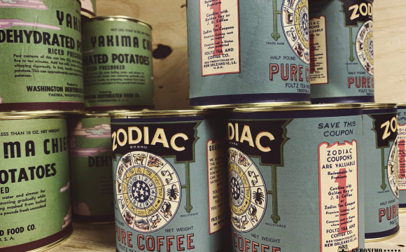 WW2 US adapted design Zodiac coffee tin full of ground coffee.