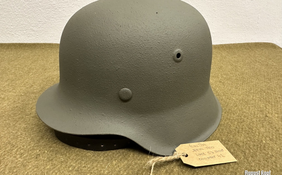 German M42 WW2 battle helmet (ckl?) 64 serial 5000, restored for reenactment use.