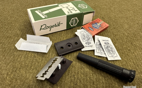 Vintage reproduction of Rogerit brand box with new reproduction razor inside.