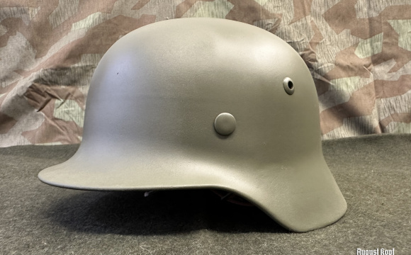 Original German M35 WW2 battle helmet SE66 serial 073, restored for reenactment use.