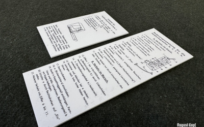 Pair of instructional sheets printed on 1,5mm thick paper desks.
