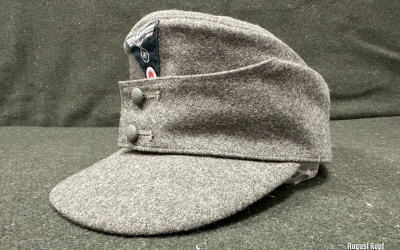 The German M43 field cap was introduced in 1943 as a practical and versatile piece of headgear for Wehrmacht troops.