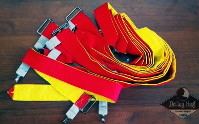 Two-color helmet strap for training purposes.