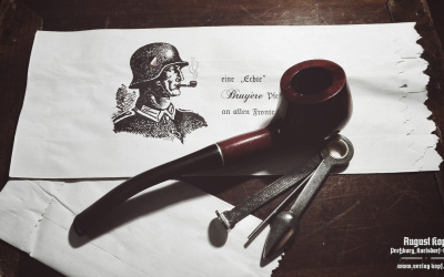 A new pipe made of nice pie-cherry wood, chosen to represent a commonly available pipe used during WW2.