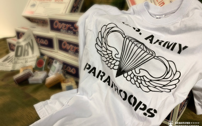 Newly made white T-shirt in sizes: S, M, L for common wearing.