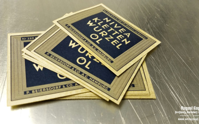 Tiny sticker for old glass bottles of hair oil, printed on craft label.