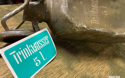 Plastic sticker stencil for popular Trinkwasser canisters.