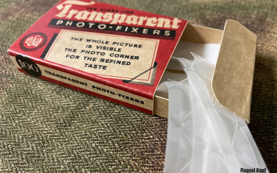 A vintage package of 100 photo corners suitable for fixing 25-50 photos into album.